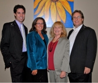 All Smiles - making a difference makes me smile - Celebrating with the OTEF team at the close of a successful AZEC09. (Left to Right:  Merlin Ward, JKW, Francine Hardaway, Steven Groves.  (Photo by Mark Goldstein)